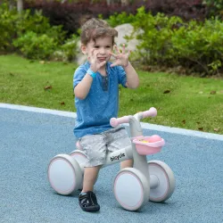 Bicicleta sin Pedales para Niños de 12-36 Meses con Asiento Ajustable Cesta y 4 Ruedas Silenciosas 56x27x39 cm Rosa - Ogal.Es