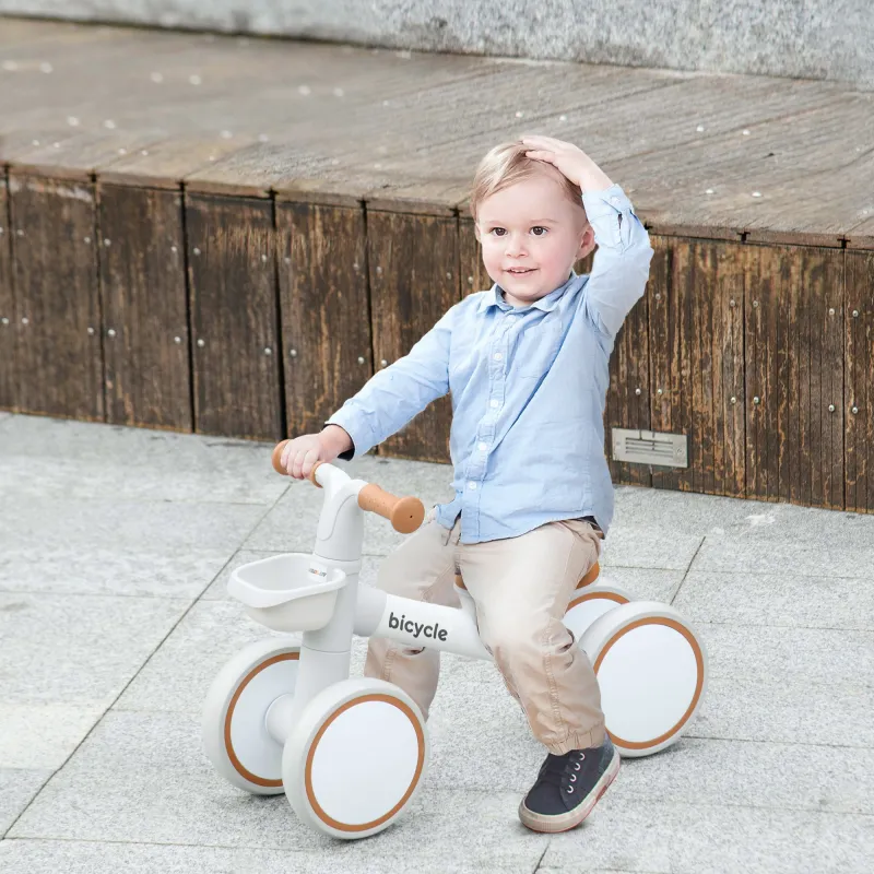 Bicicleta sin Pedales para Niños de 12-36 Meses con Asiento Ajustable Cesta y 4 Ruedas Silenciosas 56x27x39 cm B... - Ogal.Es
