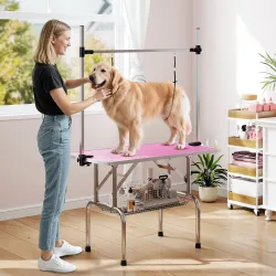 Mesa de Peluquería Canina Plegable con Cesta Metálica Barra de Acero Inoxidable Ajustable 107x60x164 cm Rosa - Ogal.Es