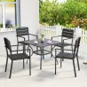 Juego de 4 Sillas de Jardín Exterior Apilables con Reposabrazos Respaldo y Asiento Marco Metálico 52x51x90 cm Negro - Ogal.Es