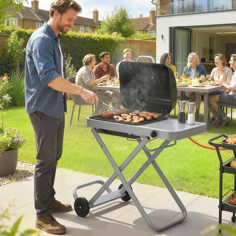 Barbacoa de Gas Plegable con Quemador 2,5 kW Tapa Termómetro Mesa Lateral y 2 Ruedas Parrilla Recogedor Grasa Negro - Ogal.Es